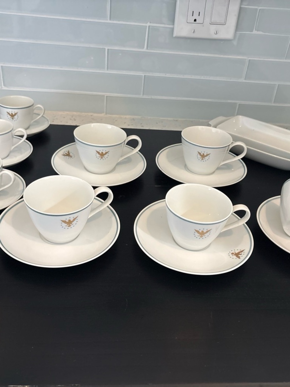 White Porcelain Teacup and Saucer Set with Gold Crest - Classic Serving Set